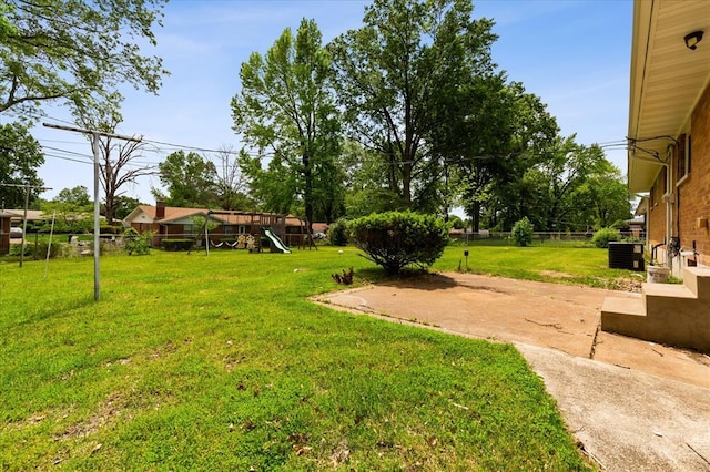 11550 Rock Hampton Dr, Hazelwood, MO 63138 - view of yard with central air condition unit, a patio area, and a playground