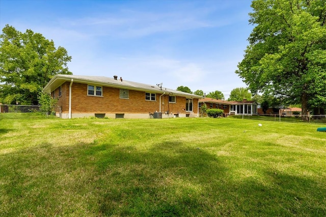 11550 Rock Hampton Dr, Hazelwood, MO 63138 - back of house with brick siding