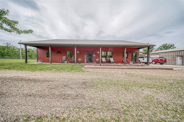 14901 State Route Ff, Edgar Springs, MO 65462 - back of house featuring a yard, a porch, and metal roof