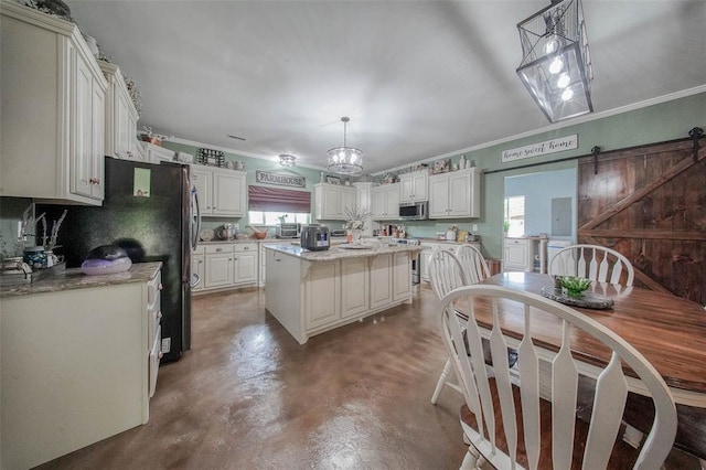 14901 State Route Ff, Edgar Springs, MO 65462 - kitchen featuring appliances with stainless steel finishes, finished concrete flooring, ornamental molding, a barn door, and white cabinets