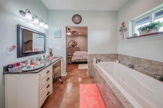 14901 State Route Ff, Edgar Springs, MO 65462 - bathroom featuring concrete floors, a jetted tub, vanity, ensuite bathroom, and a ceiling fan