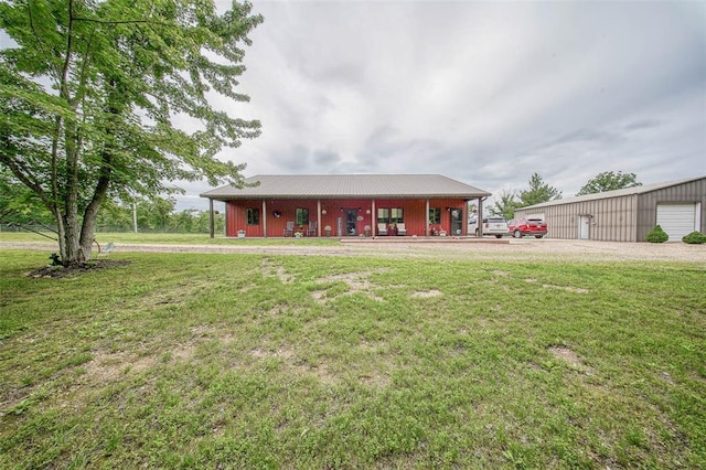 14901 State Route Ff, Edgar Springs, MO 65462 - ranch-style house featuring a front lawn, a porch, and an outdoor structure