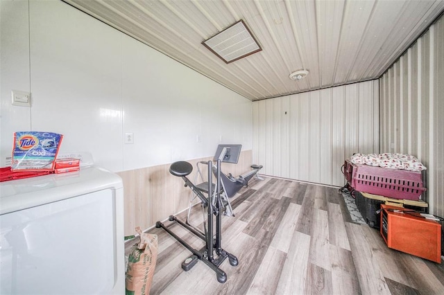 14901 State Route Ff, Edgar Springs, MO 65462 - workout area featuring washer / dryer and wood finished floors