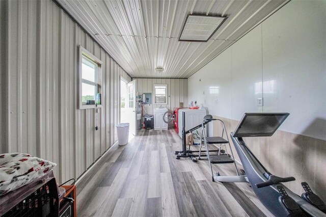 14901 State Route Ff, Edgar Springs, MO 65462 - workout room featuring wood finished floors and washer and clothes dryer