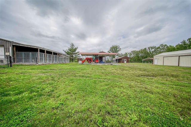 14901 State Route Ff, Edgar Springs, MO 65462 - view of green lawn with a pole building and an outbuilding