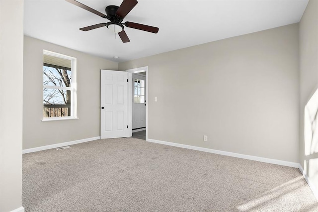 7097 State Route 3, Evansville, IL 62242 - unfurnished bedroom with carpet floors, baseboards, and ceiling fan