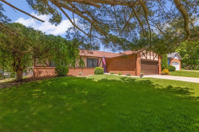100 White Pine Ave, Ofallon, IL 62269 - view of front facade with brick siding, a front yard, an attached garage, and concrete driveway