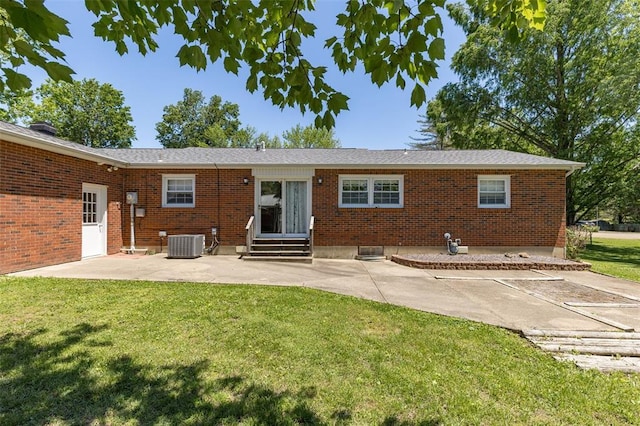 114 Fairlane Dr, Ironton, MO 63650 - back of house featuring a patio, a lawn, entry steps, and brick siding