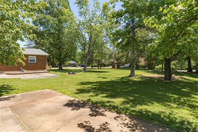 114 Fairlane Dr, Ironton, MO 63650 - view of grassy yard with a patio area
