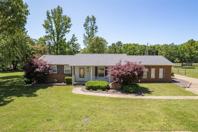 114 Fairlane Dr, Ironton, MO 63650 - single story home with a porch, brick siding, and a front lawn