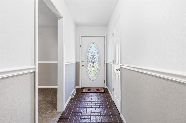 114 Fairlane Dr, Ironton, MO 63650 - doorway to outside with brick floors and baseboards