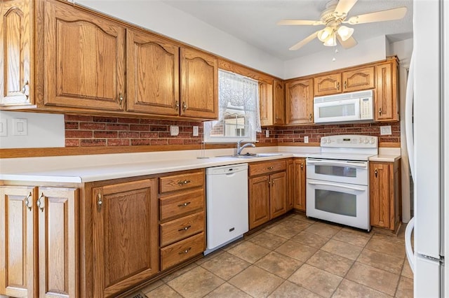 114 Fairlane Dr, Ironton, MO 63650 - kitchen featuring white appliances, a sink, and brown cabinetry