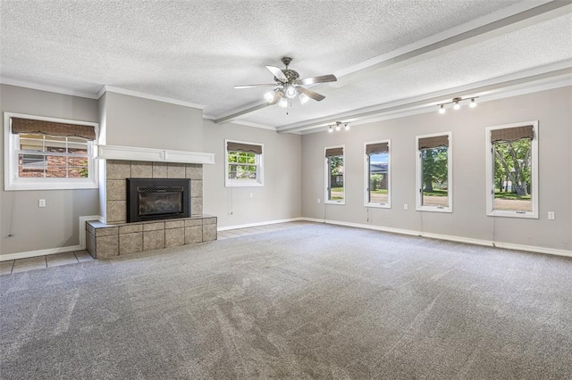 114 Fairlane Dr, Ironton, MO 63650 - unfurnished living room with a textured ceiling, baseboards, a fireplace, carpet flooring, and a ceiling fan