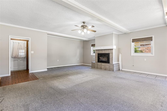 114 Fairlane Dr, Ironton, MO 63650 - unfurnished living room with carpet, a textured ceiling, baseboards, a ceiling fan, and a fireplace
