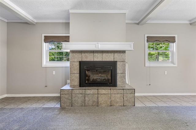 114 Fairlane Dr, Ironton, MO 63650 - detailed view of a textured ceiling, beam ceiling, a tile fireplace, carpet floors, and baseboards