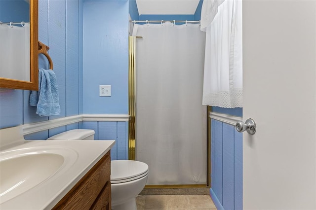 114 Fairlane Dr, Ironton, MO 63650 - full bath with toilet, vanity, curtained shower, and tile patterned floors