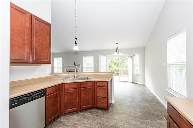 614 Palisades View Dr, Eureka, MO 63025 - kitchen featuring dishwasher, a sink, a peninsula, light wood finished floors, and light countertops