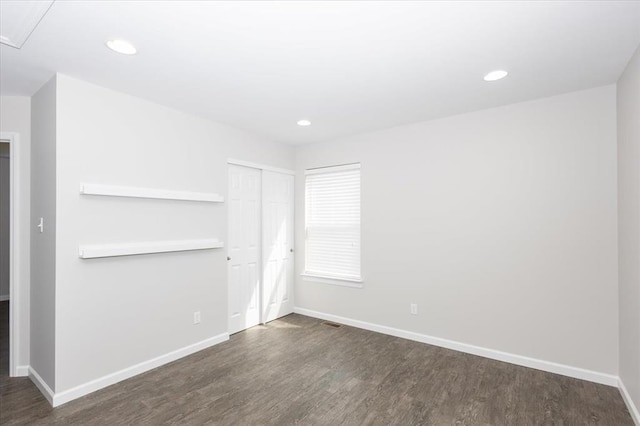 614 Palisades View Dr, Eureka, MO 63025 - unfurnished bedroom with wood finished floors, baseboards, a closet, and recessed lighting