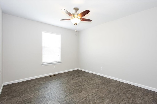 614 Palisades View Dr, Eureka, MO 63025 - unfurnished room with dark wood-style floors, baseboards, and ceiling fan