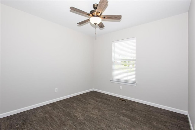 614 Palisades View Dr, Eureka, MO 63025 - unfurnished room featuring dark wood-style flooring, baseboards, and ceiling fan