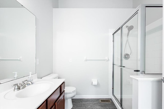 614 Palisades View Dr, Eureka, MO 63025 - full bath with vanity, toilet, a shower stall, baseboards, and wood finished floors