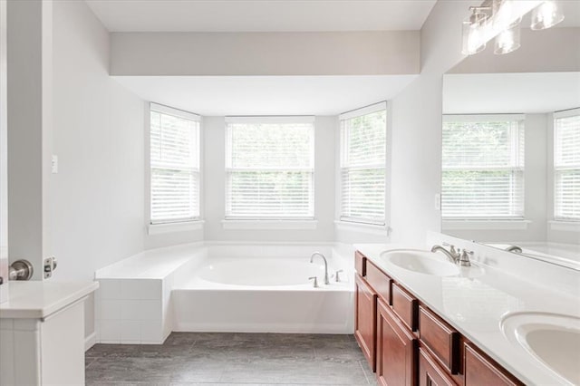 614 Palisades View Dr, Eureka, MO 63025 - bathroom featuring a bath and double vanity