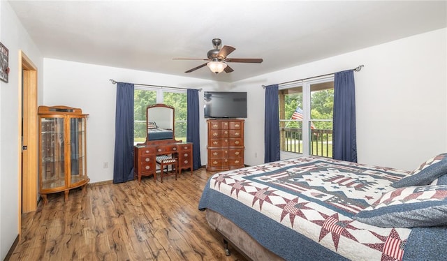 19285 State Route Ee, St James, MO 65559 - bedroom featuring wood finished floors and a ceiling fan