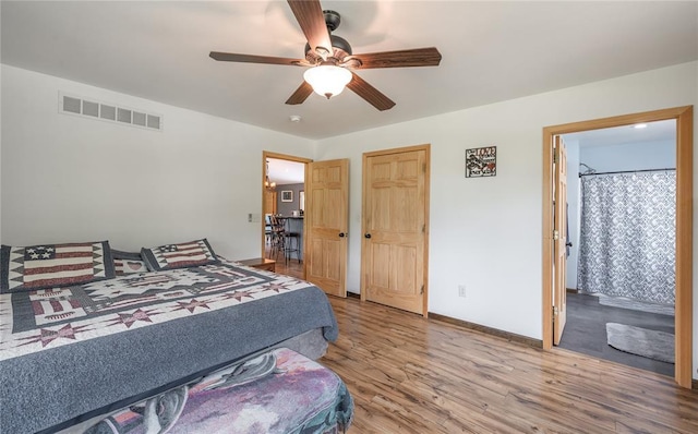 19285 State Route Ee, St James, MO 65559 - bedroom featuring wood finished floors, baseboards, and ceiling fan