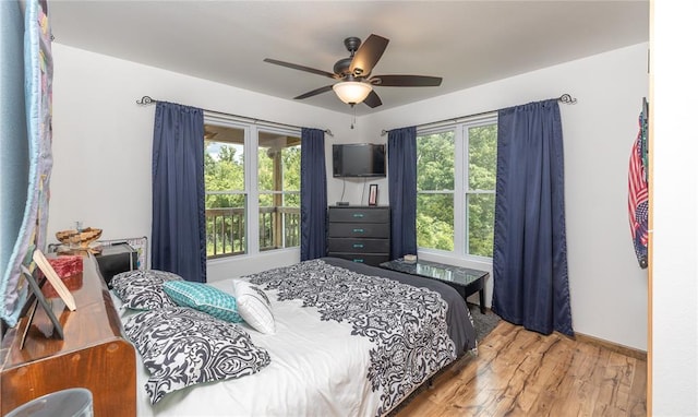 19285 State Route Ee, St James, MO 65559 - bedroom with wood finished floors and a ceiling fan