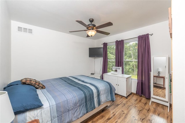 19285 State Route Ee, St James, MO 65559 - bedroom with light wood finished floors and a ceiling fan