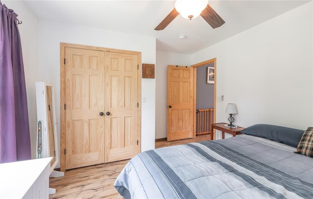 19285 State Route Ee, St James, MO 65559 - bedroom with light wood-style flooring, a closet, and ceiling fan