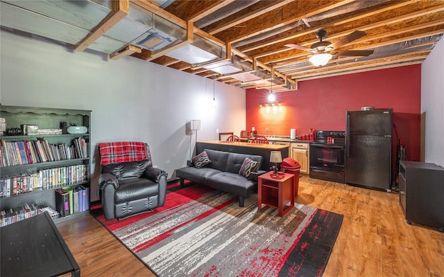 19285 State Route Ee, St James, MO 65559 - living area featuring light wood-style flooring and ceiling fan