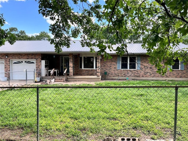 12241 Pipeline Rd, Bourbon, MO 65441 - ranch-style house featuring an attached garage, metal roof, brick siding, and covered porch