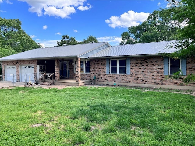 12241 Pipeline Rd, Bourbon, MO 65441 - ranch-style house with a garage, metal roof, a porch, and brick siding