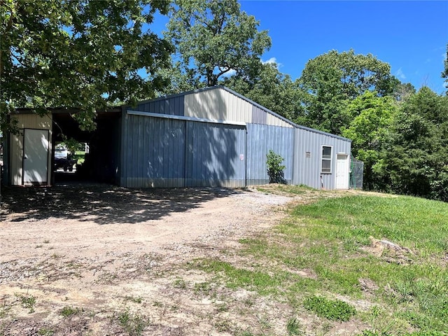 12241 Pipeline Rd, Bourbon, MO 65441 - view of pole building with dirt driveway