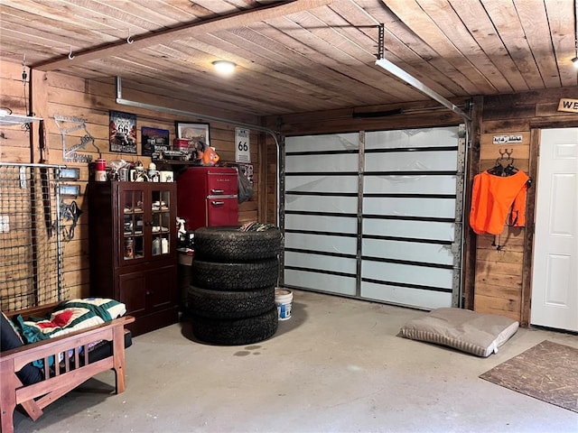 12241 Pipeline Rd, Bourbon, MO 65441 - garage featuring wood walls and wooden ceiling