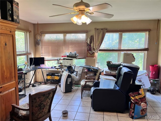 12241 Pipeline Rd, Bourbon, MO 65441 - living room featuring a ceiling fan, light tile patterned floors, and an office area