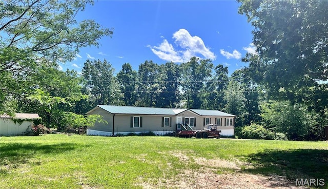 12241 Pipeline Rd, Bourbon, MO 65441 - manufactured / mobile home with a front lawn