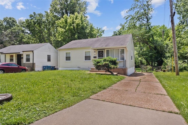 270 Estridge Rd, Saint Louis, MO 63137 - view of front of home with a front lawn and concrete driveway