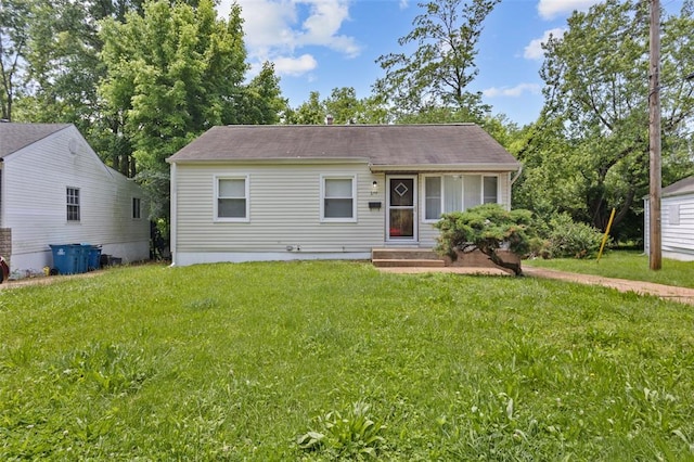 270 Estridge Rd, Saint Louis, MO 63137 - view of front facade with a front lawn and a shingled roof