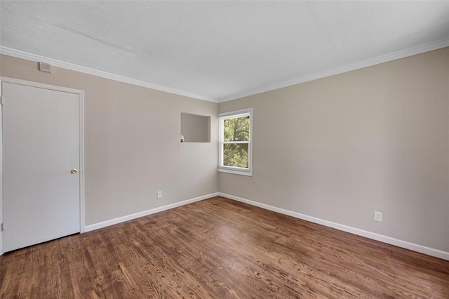 270 Estridge Rd, Saint Louis, MO 63137 - unfurnished room featuring wood finished floors, baseboards, and crown molding