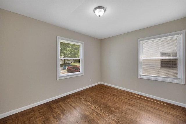270 Estridge Rd, Saint Louis, MO 63137 - empty room featuring dark wood finished floors and baseboards