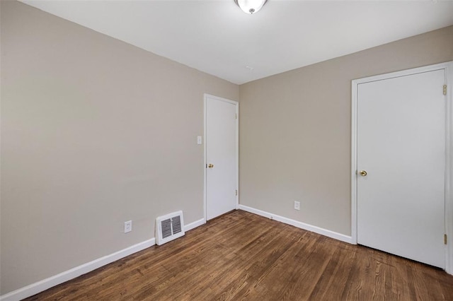270 Estridge Rd, Saint Louis, MO 63137 - unfurnished bedroom with wood finished floors and baseboards