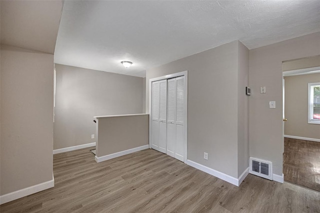 270 Estridge Rd, Saint Louis, MO 63137 - spare room featuring wood finished floors and baseboards