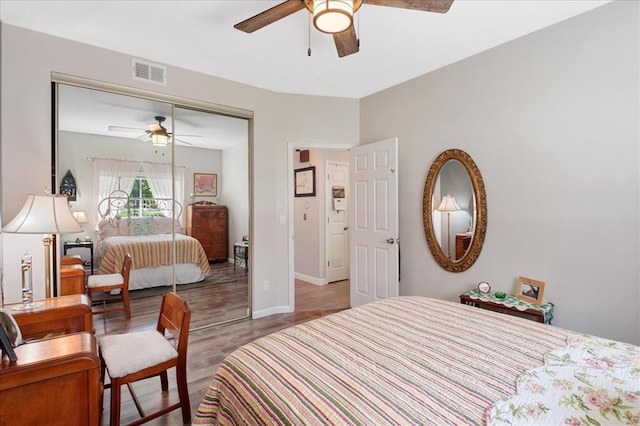 321 Kipling Way Unit G, Weldon Spring, MO 63304 - bedroom with a closet, wood finished floors, baseboards, and ceiling fan