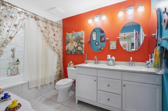 321 Kipling Way Unit G, Weldon Spring, MO 63304 - full bathroom featuring shower / tub combo with curtain, double vanity, and toilet