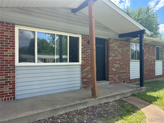 11214 Terry Ave, Bridgeton, MO 63044 - view of exterior entry with brick siding