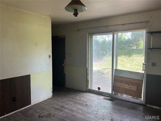11214 Terry Ave, Bridgeton, MO 63044 - unfurnished room with wood finished floors and plenty of natural light