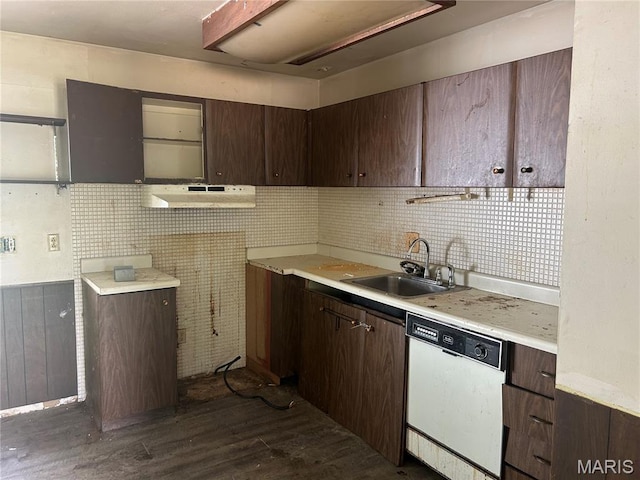 11214 Terry Ave, Bridgeton, MO 63044 - kitchen featuring dishwasher, a sink, under cabinet range hood, dark wood-style flooring, and dark brown cabinets