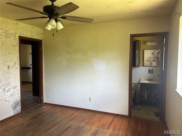 11214 Terry Ave, Bridgeton, MO 63044 - spare room with wood finished floors, baseboards, a sink, and ceiling fan